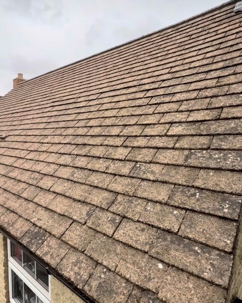 The same roof clean after moss removal